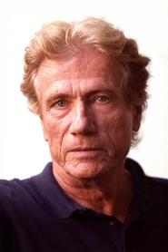 Jürgen Prochnow is Maxwell Dent