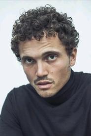 Karl Glusman is John